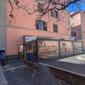 Pizzeria del Ghetto - Outside.  Covered outside seating. - Pizza Near Me - Civitavecchia, RM