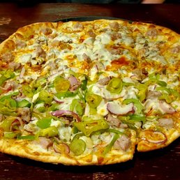 a whole pizza with various toppings
