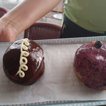 Stella's - homemade doughnuts... delicious. ding dong and sunrise doughnut (lemon cream filling covered with a blueberry glaze) - Delis Near Me - Gulfport, Florida Stella's - homemade doughnuts... delicious. ding dong and sunrise doughnut (lemon cream filling covered with a blueberry glaze) - Delis Near Me - Gulfport, Florida