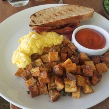 Deane House - Scrambled eggs with their sourdough toast (baked fresh every morning) and housemade ketchup (light and flavourful). - Canadian (New) Near Me - Calgary, Alberta Deane House - Scrambled eggs with their sourdough toast (baked fresh every morning) and housemade ketchup (light and flavourful). - Canadian (New) Near Me - Calgary, Alberta