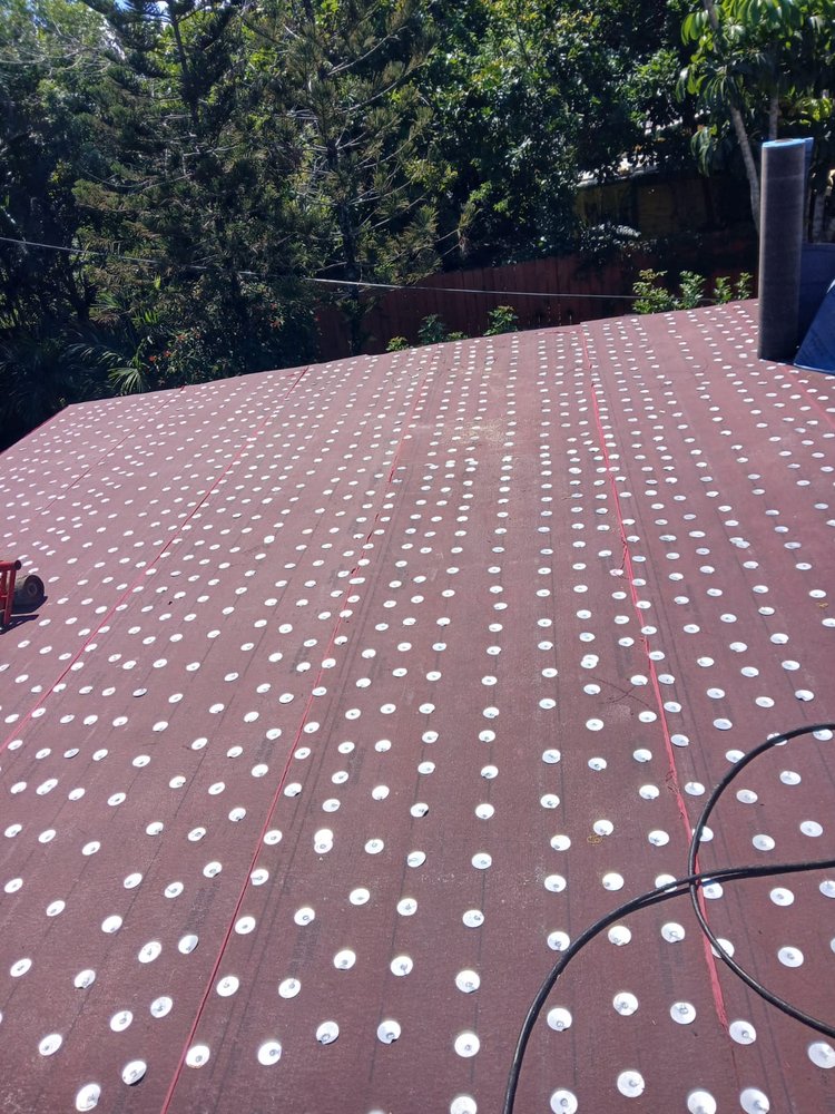 Slide of MZ Roofing Service