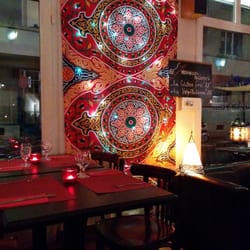 Restaurant la Caravane Passe - Beautiful wall art and a gluten free menu!