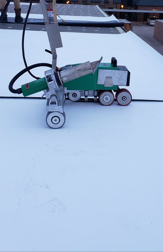 Slide of TPO Pros Roofing & Restoration