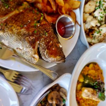 Mignonette - Fish of the day, mushrooms, cauliflower, baked redfish. - New American Near Me - Miami, Florida