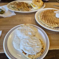 Waffle House - Russellville - Biscuit and gravy, waffle, bacon/egg/cheese biscuit and hash browns with jalapenos.. yum