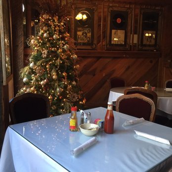 Cowboy Jim's Riverside Restaurant - a christmas tree in the background - Steakhouses Near Me - Prentiss, Mississippi Cowboy Jim's Riverside Restaurant - a christmas tree in the background - Steakhouses Near Me - Prentiss, Mississippi