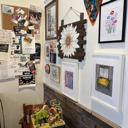 Espresso Yourself Coffee & Cafe - More local art and part of the kids nook
