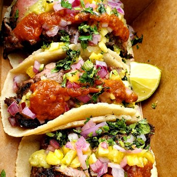 Cultrō - three tacos in a box on a table - Food Trucks Near Me - Providence, Rhode Island