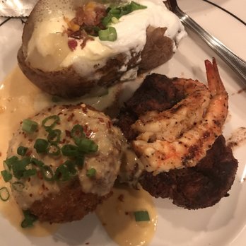 Saltgrass Steak House - Filet Mignon, crab cake and baked potato. Filet-Good and Juicy, C Cake- Cold, Baked potato over cooked. - Steakhouses Near Me - Webster, Texas