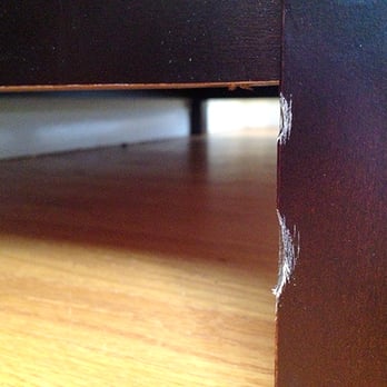 Sam's Moving - You can tell by the grooves that actual chunks of wood were gone. Wouldn't have happened with a furniture pad covering it. - Movers Near Me - Central Point, Oregon