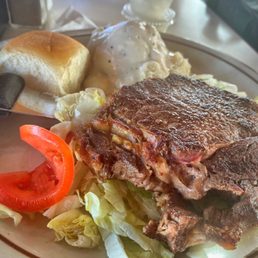 Ribeye steak, mash potatoes with white gravy Ribeye steak, mash potatoes with white gravy