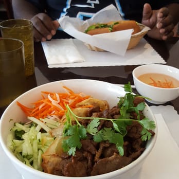 Pho Hot - Grilled Pork and egg roll. In the back is a pork sandwich. - Vietnamese Near Me - Glendale, California