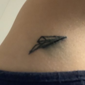 Beyond Kreations Tattoo - Paper airplane ink bleed all over lines extremely broken and not straight. - Tattoo Near Me - Fullerton, California Beyond Kreations Tattoo - Paper airplane ink bleed all over lines extremely broken and not straight. - Tattoo Near Me - Fullerton, California