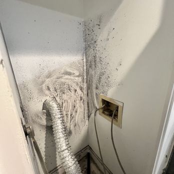 Dryer Vent Wizard of DC and Montgomery County - Before photo: behind the dryer. - Air Duct Cleaning Near Me Dryer Vent Wizard of DC and Montgomery County - Before photo: behind the dryer. - Air Duct Cleaning Near Me