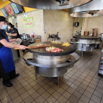 Red Iron Mongolian BBQ - a man preparing food - Barbeque Near Me - Redondo Beach, California Red Iron Mongolian BBQ - a man preparing food - Barbeque Near Me - Redondo Beach, California