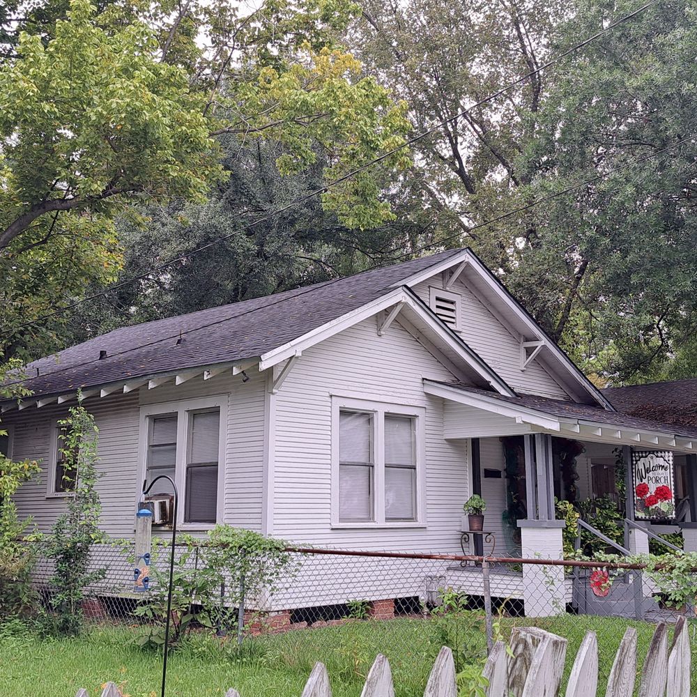 Slide of Champion Roofing Solutions