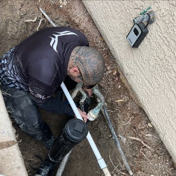 HI²LV Services - a man fixing a pipe - Plumbing Near Me HI²LV Services - a man fixing a pipe - Plumbing Near Me