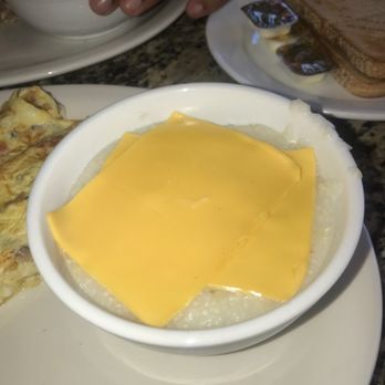 Maplewood Diner - Not happy with these Cheese grits hate when they just smack 2 slices on top - American Near Me - Maplewood, New Jersey Maplewood Diner - Not happy with these Cheese grits hate when they just smack 2 slices on top - American Near Me - Maplewood, New Jersey