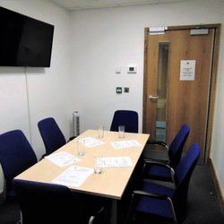 Merstham Community Facility Trust - Small meeting room. Free WiFi, Smart TV. Ideal for small meetings, board style interviews, small group presentations, training etc.