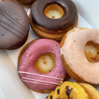 Third Culture Bakery - Berkeley - Vietnamese Coffee, Chocolate, Strawberry Guava, Mango Passionfruit, Strawberry & Cream Mochi Donuts + Mochi brownie (Clockwise) - Bakeries Near Me - Berkeley, California Third Culture Bakery - Berkeley - Vietnamese Coffee, Chocolate, Strawberry Guava, Mango Passionfruit, Strawberry & Cream Mochi Donuts + Mochi brownie (Clockwise) - Bakeries Near Me - Berkeley, California