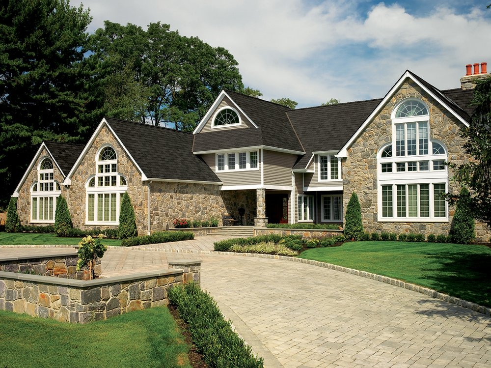 Slide of Extra Mile Roofing