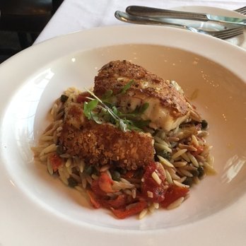 Alma Nove - herb-roasted cod, orzo, roasted tomatoes, capers, artichokes - Italian Near Me - Hingham, Massachusetts Alma Nove - herb-roasted cod, orzo, roasted tomatoes, capers, artichokes - Italian Near Me - Hingham, Massachusetts