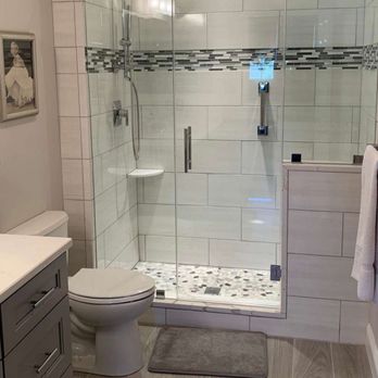 A-Superior Construction - a bathroom with a walk in shower - Masonry/Concrete Near Me
