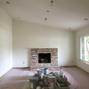 Handy Home Improvement - Midway through the project. - Recessed Lights, updated fireplace, fresh paint - General Contractors Near Me - Huntington Beach, California