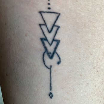 Royal Sword Tattoo & Piercing - Look at how crooked tip triangle looks. She has been asked if it was a prison tat! Wobbly lines. - Tattoo Near Me - Grover Beach, California Royal Sword Tattoo & Piercing - Look at how crooked tip triangle looks. She has been asked if it was a prison tat! Wobbly lines. - Tattoo Near Me - Grover Beach, California