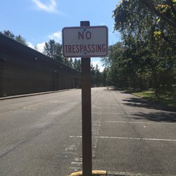 Tukwila Pond Park - A "No Trespassing" sign leading to the primary park access point. Not a good sign. I and several other walkers ignored it.