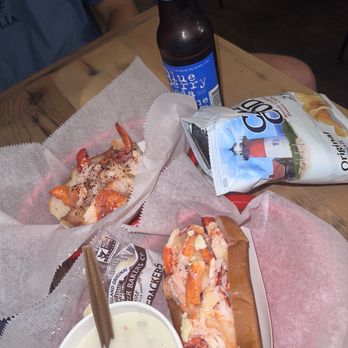 Luke's Lobster Rittenhouse - Farther roll: spicy honey butter lobster roll Closer roll: truffle butter lobster roll - Seafood Near Me - Philadelphia, Pennsylvania Luke's Lobster Rittenhouse - Farther roll: spicy honey butter lobster roll Closer roll: truffle butter lobster roll - Seafood Near Me - Philadelphia, Pennsylvania