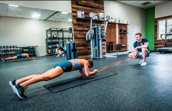 1:1 Personal Training - The most effective and impactful service we provide is a 1-on-1 session with our personal trainers. We offer individual training programs designed to increase performance in all areas. Each program is tailored specifically to your goals, whether that be losing weight, improving speed and agility, muscle formation or simple pain management. We start off every client by providing a goal setting session and biomechanical analysis. Our program lengths vary based upon the clients needs but are tailored to see results in the shortest amount of time. 1:1 Personal Training - The most effective and impactful service we provide is a 1-on-1 session with our personal trainers. We offer individual training programs designed to increase performance in all areas. Each program is tailored specifically to your goals, whether that be losing weight, improving speed and agility, muscle formation or simple pain management. We start off every client by providing a goal setting session and biomechanical analysis. Our program lengths vary based upon the clients needs but are tailored to see results in the shortest amount of time.