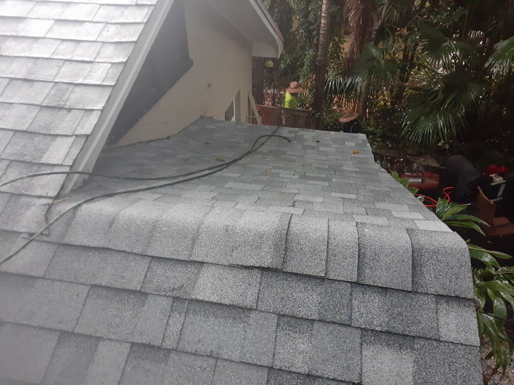 Slide of CB Roofing Construction