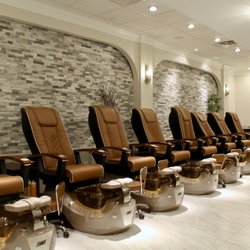 Modish Nail Spa - Philadelphia - Our massage spa chairs come with cup holders and usb ports for you to charge your phone!