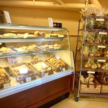 Le Panier - 1st case filled with a variety of croissants. Shelves of packaged sables and meringues. A staff member start taking your order around here. - Bakeries Near Me - Seattle, Washington Le Panier - 1st case filled with a variety of croissants. Shelves of packaged sables and meringues. A staff member start taking your order around here. - Bakeries Near Me - Seattle, Washington