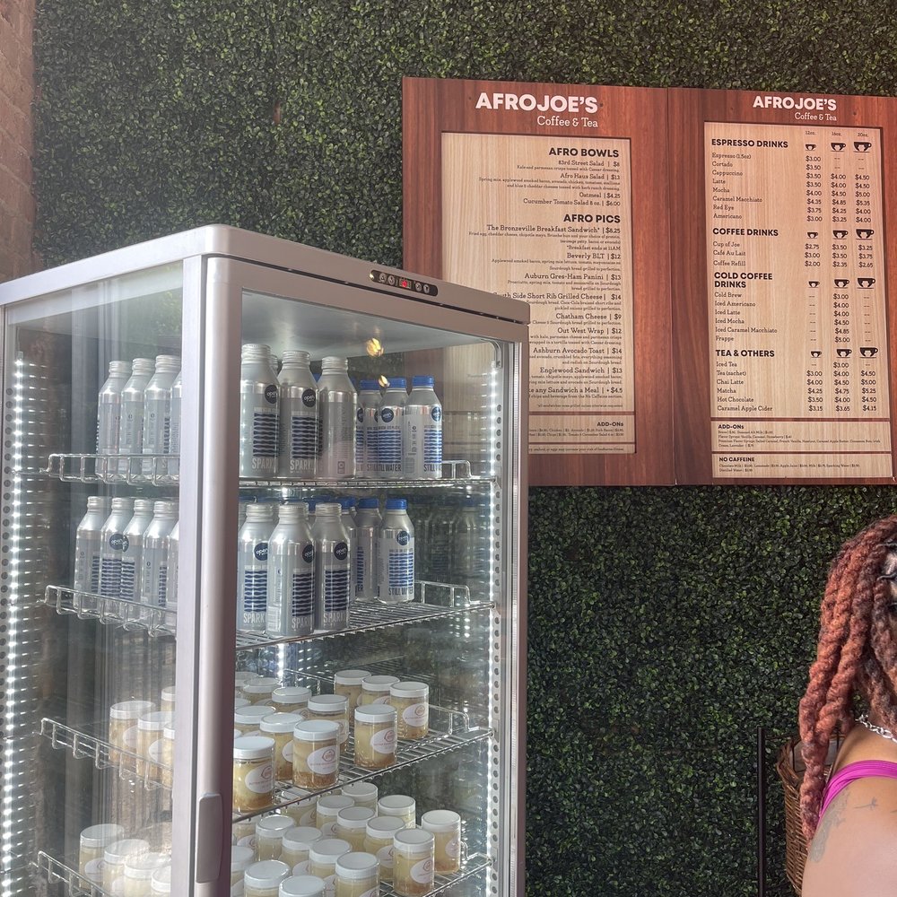 Afro Joe’s Coffee & Tea - Menu and fridge with cheesecake cups - Coffee & Tea Near Me - Chicago, Illinois