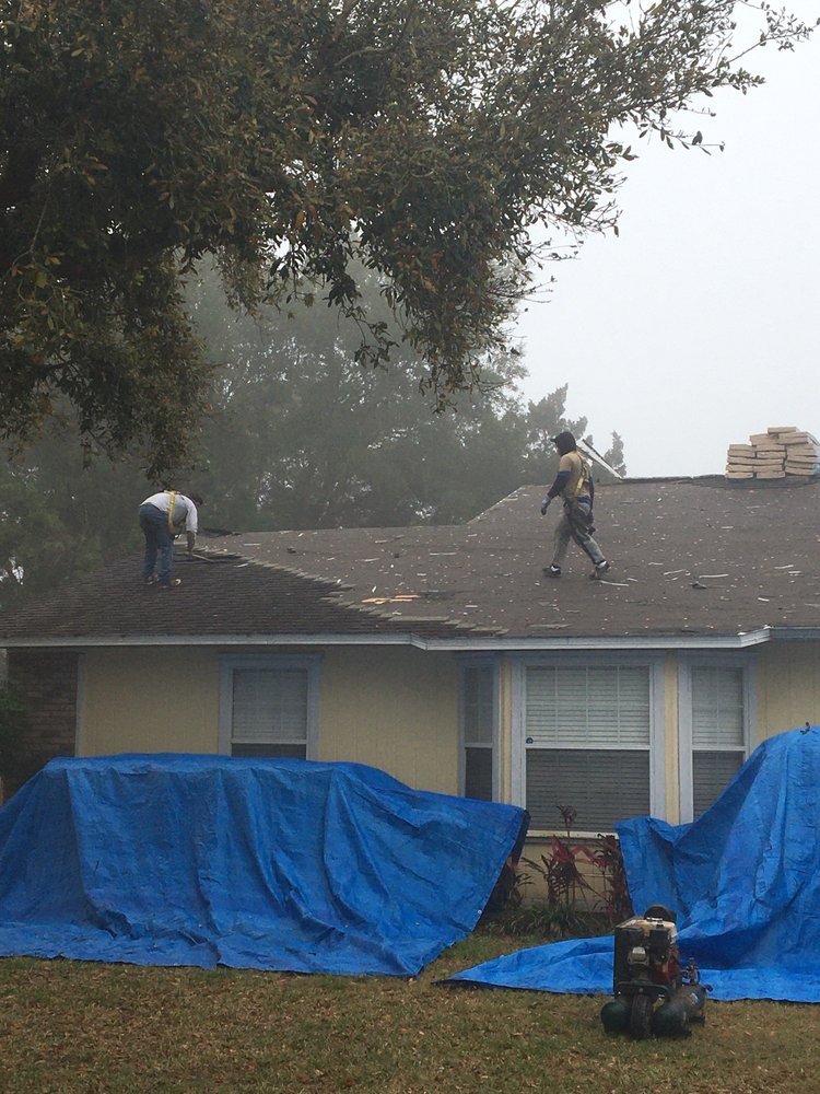 Slide of Janney Roofing