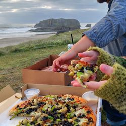 Pastries & Pizza - This photo features our beautiful vegetarian pizza with pesto sauce and parmesan cups.