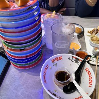 Shinjuku Station - Plate not taken by staff since they pass it to their only busboy - Conveyor Belt Sushi Near Me - South Plainfield, New Jersey Shinjuku Station - Plate not taken by staff since they pass it to their only busboy - Conveyor Belt Sushi Near Me - South Plainfield, New Jersey