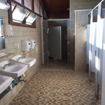 Keuka Lake State Park - Deer run loop bathroom. The last stall is ADA compliant and has a toilet, sink, and shower stall with bench. - Hiking Near Me - Keuka Park, New York Keuka Lake State Park - Deer run loop bathroom. The last stall is ADA compliant and has a toilet, sink, and shower stall with bench. - Hiking Near Me - Keuka Park, New York