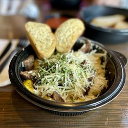 Noodles and Company - Beef Steak Stroganoff and garlic bread on the side