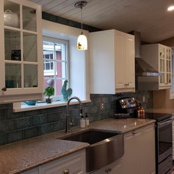 MC Remodeling - Ikea Cabinets, Onyx Lamp, Moda Del Mar Patina Lagoon Tile Back splash, Silestone Blue Sahara Quartz Counter,    Stainless Steel Apron Sink
