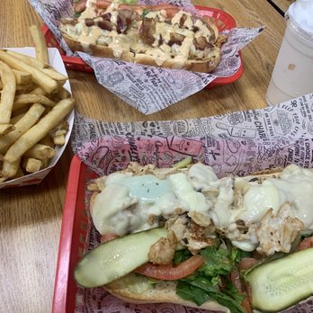 Charleys Cheesesteaks - Top (reg bacon chipotle chicken) Bottom (reg chicken Philly) Large order ORIGINAL FRIES - Cheesesteaks Near Me - Las Vegas, Nevada Charleys Cheesesteaks - Top (reg bacon chipotle chicken) Bottom (reg chicken Philly) Large order ORIGINAL FRIES - Cheesesteaks Near Me - Las Vegas, Nevada
