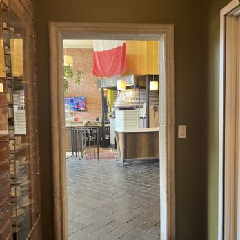 Caffè Calabria - Bathroom Hallway, ft Coffee Cup wall and pizza oven - Coffee & Tea Near Me - San Diego, California Caffè Calabria - Bathroom Hallway, ft Coffee Cup wall and pizza oven - Coffee & Tea Near Me - San Diego, California