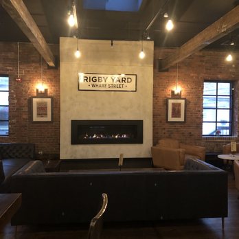 Rigby Yard - Sitting area in front of fireplace - Beer, Wine & Spirits Near Me - Portland, Maine Rigby Yard - Sitting area in front of fireplace - Beer, Wine & Spirits Near Me - Portland, Maine