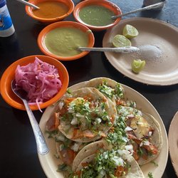 El Buen Pastor - 5 tacos for $2 - comes with chips and salsas as well. The Al pastor is delicious