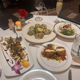 Sauteed Calamari, Crispy Crab Cakes, oysters, Ouisie's BLT Wedge Salad Sauteed Calamari, Crispy Crab Cakes, oysters, Ouisie's BLT Wedge Salad
