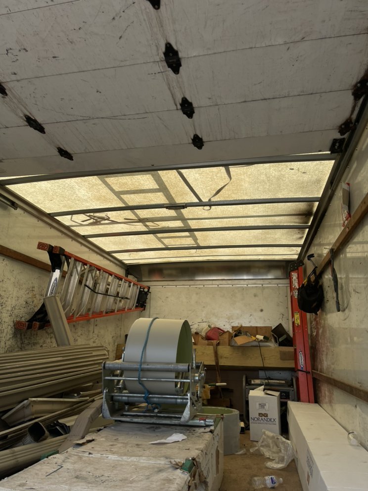 Slide of Phil The Roofer