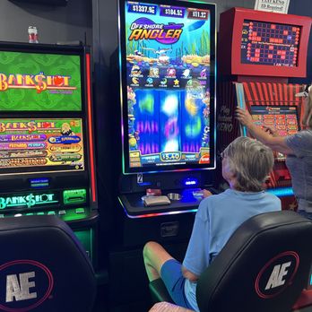 Blue Hill Tavern - two people playing a video game - Bars Near Me - Blue Hill, Nebraska Blue Hill Tavern - two people playing a video game - Bars Near Me - Blue Hill, Nebraska