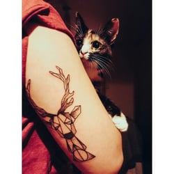 Tooth And Claw Tattoos